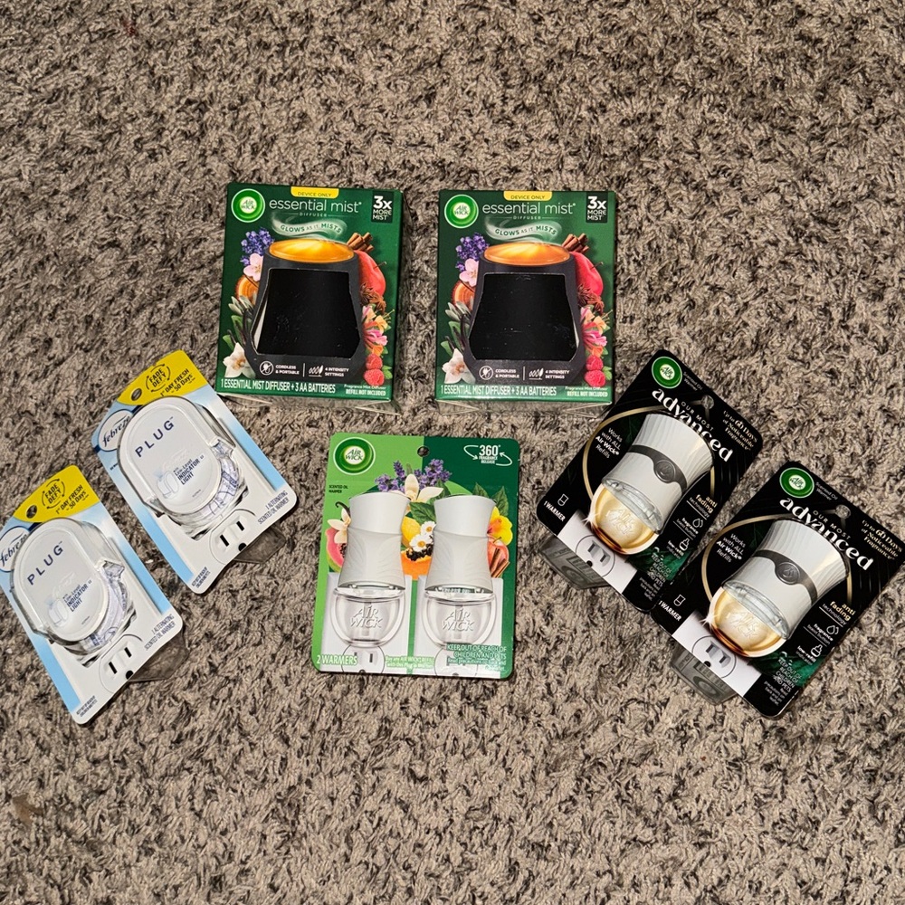 Lot of Various Plug-in Warmers & Oil Diffusers — New in Packaging